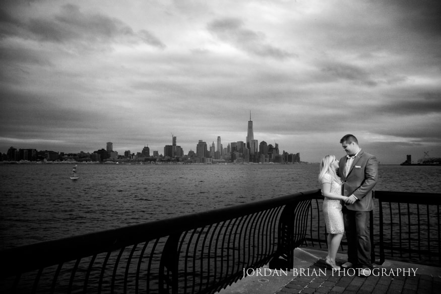 Diana and Todd strolling through Hoboken during their engagement session