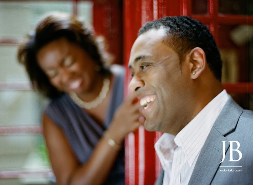 Adrienne and Joel candid moment during Philadelphia city engagement portraits