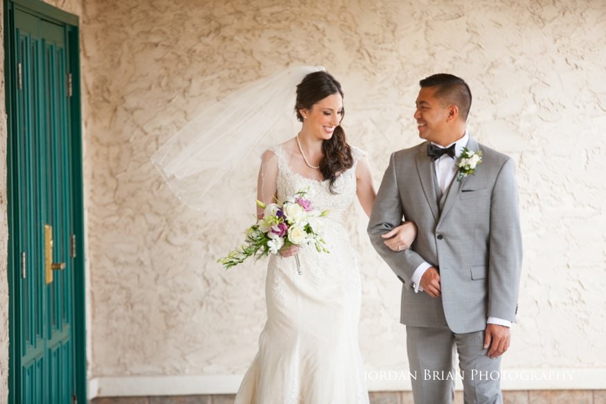 bride and groom at outdoor wedding ceremony at Renault Winery