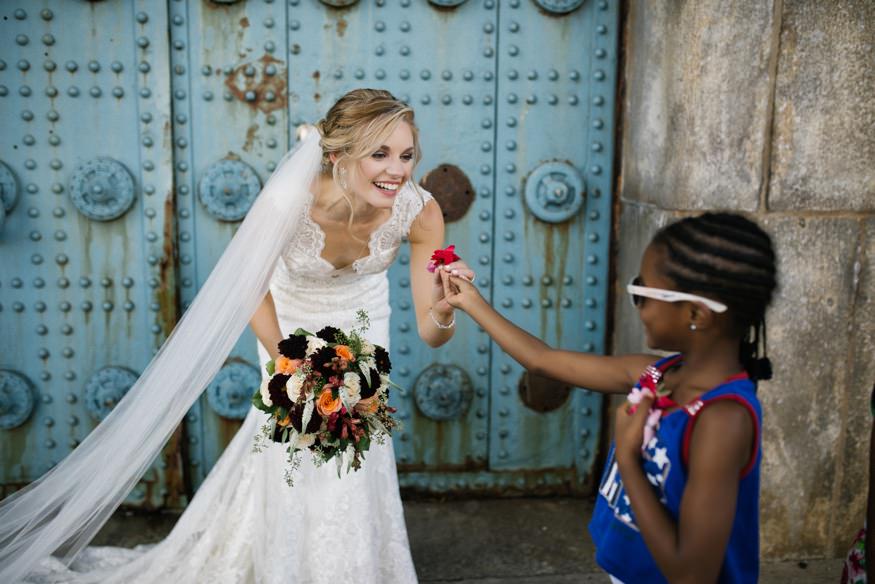 Cassandra and Ray wedding guest crashing the frame unintentionally