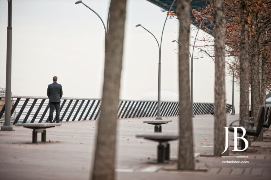 Beth and Nic Philadelphia elopement Race Street Pier wooden walkway moment