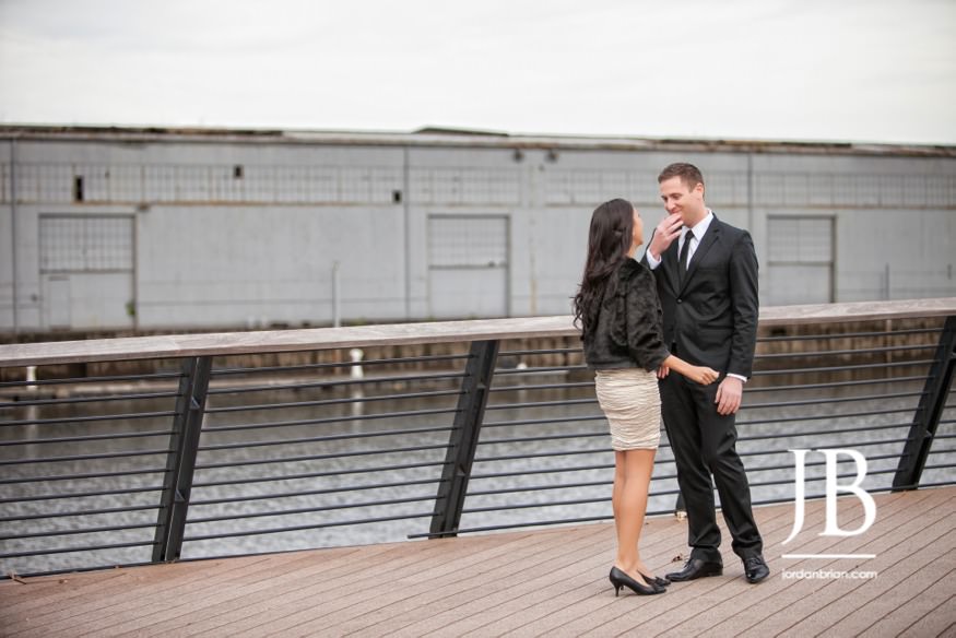 Beth and Nic candid connection Race Street Pier Philadelphia elopement photographs
