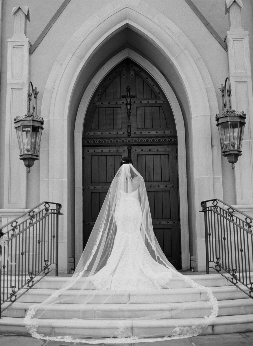 Wedding portraits in front of the chapel at the Park Chateau.