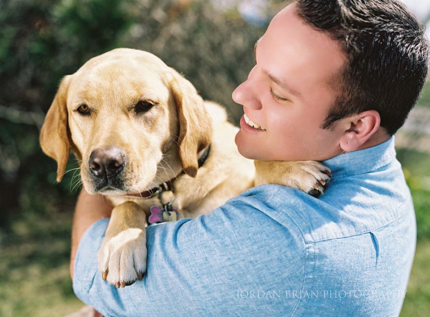 groom with dog for long branch beach engagement