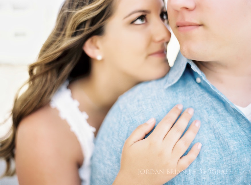 bride and groom portraits at long branch beach engagement session
