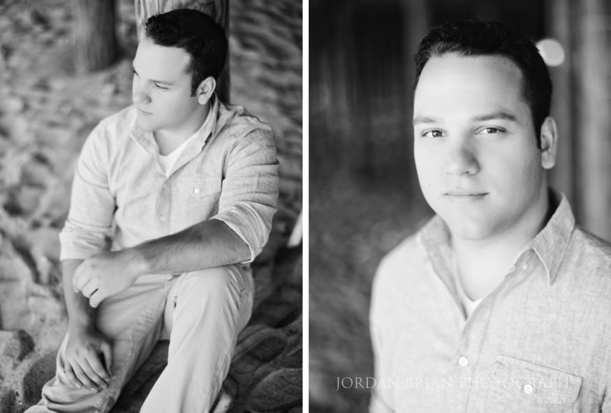 black and white portrait of groom under the pier at long branch beach engagement