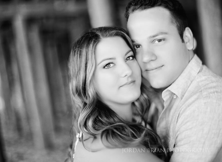 black and white film portrait of couple McLoone's Pier House Engagement session