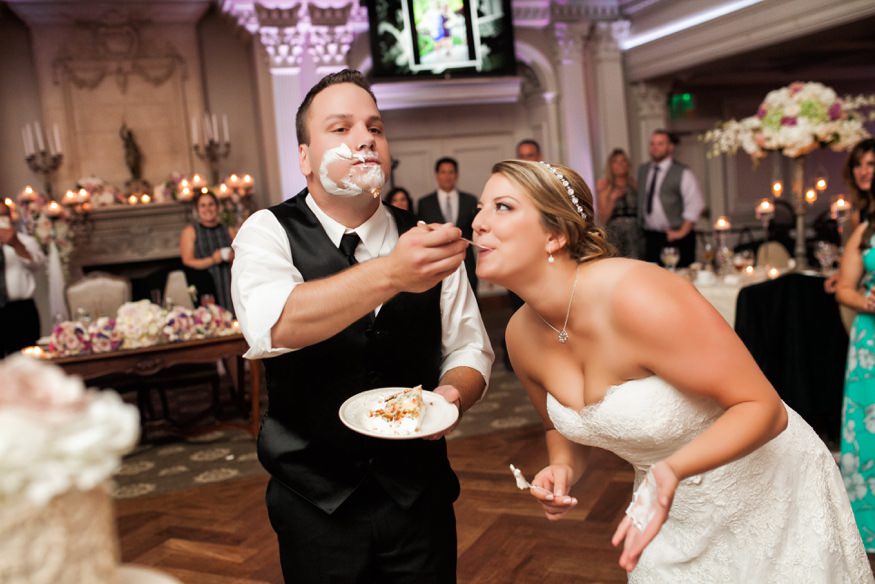 Bride and groom cut the cake at Park Savoy summer wedding.