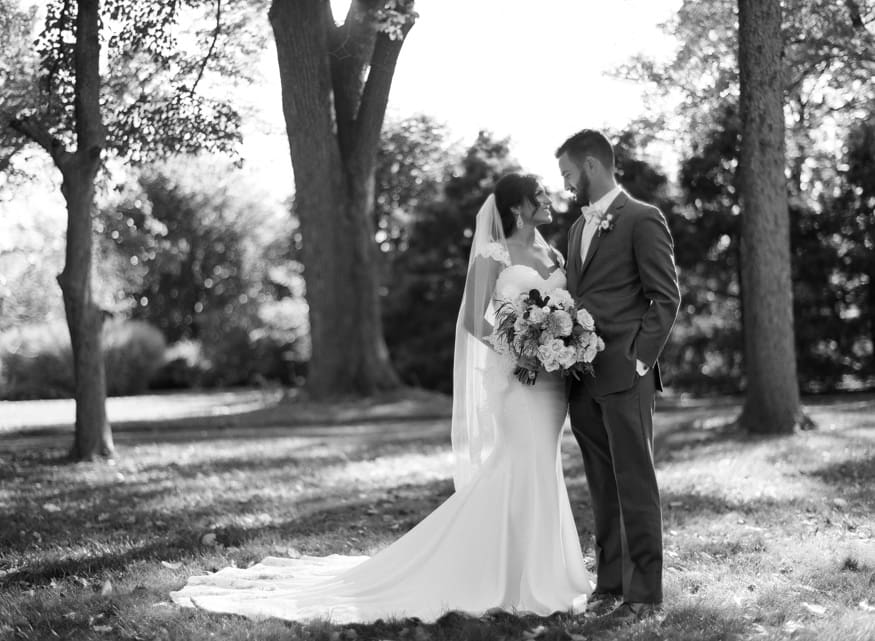 Bride and Groom black and white photo at fall wedding at Knowlton Mansion.