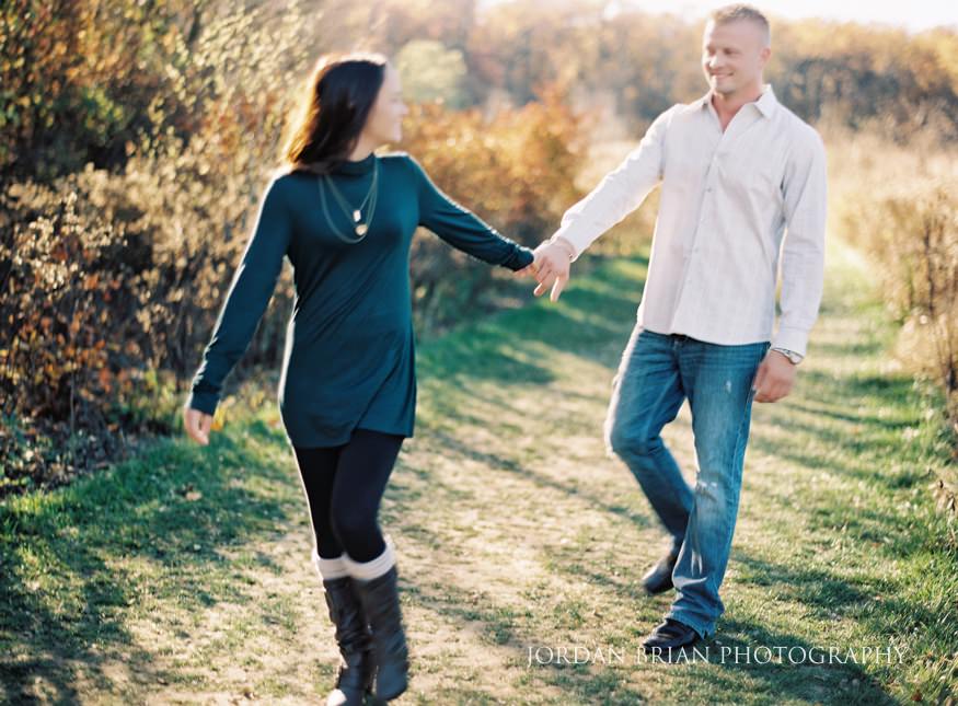 Christina and Brandon in golden hour light at their Longwood Gardens fall engagement session