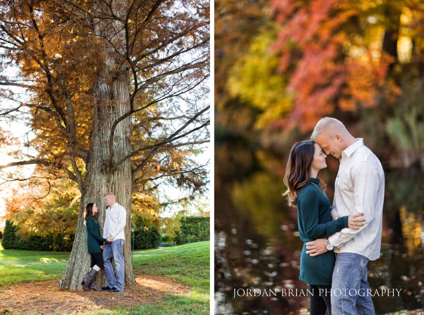 Christina and Brandon among the fall trees at the Longwood Gardens pond engagement session