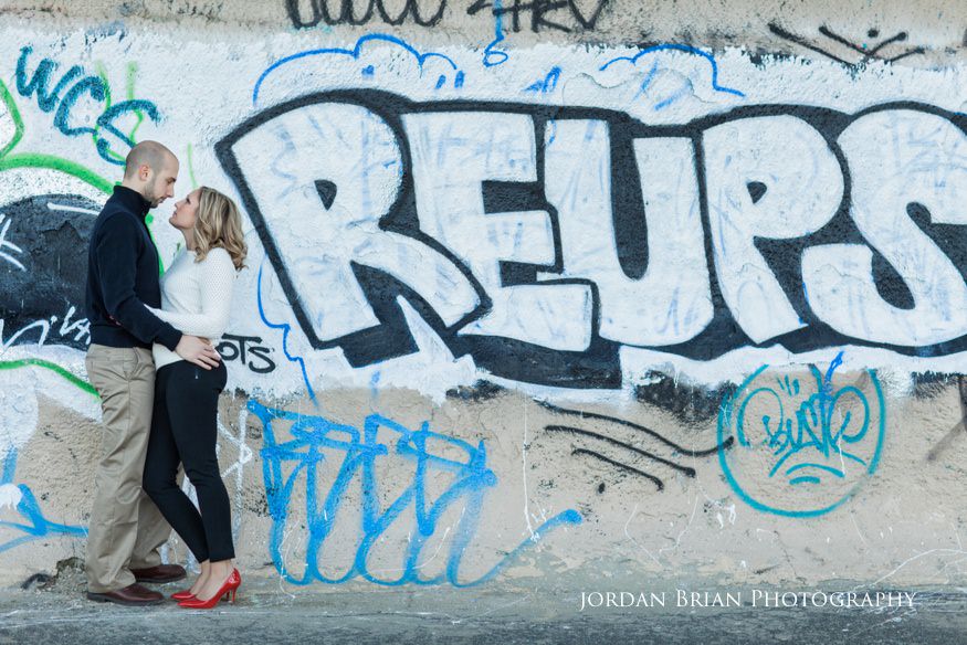 couple infront of graffiti at fdr park engagement session