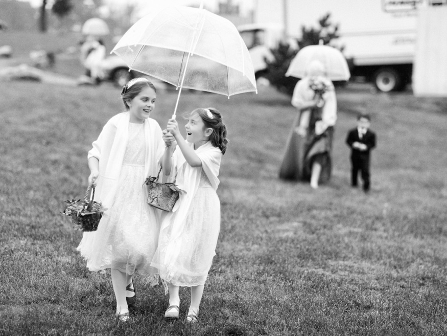 Bridal party portraits in the rain at the Brandywine Manor House wedding.