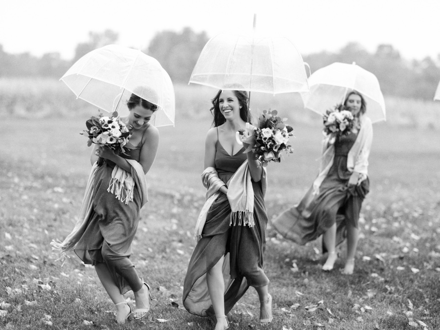 Bridal party portraits in the rain at the Brandywine Manor House wedding.