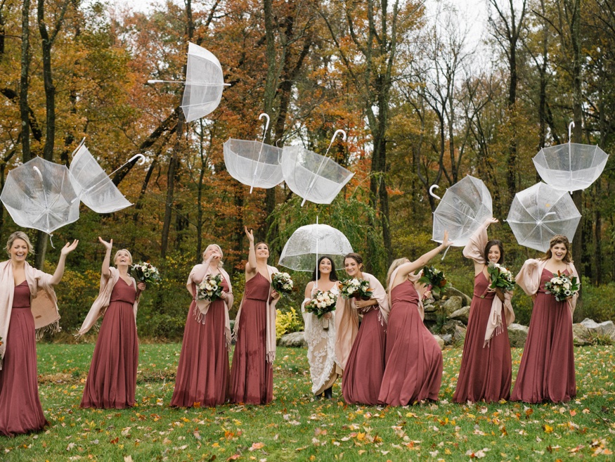 Bridal party portraits in the rain at the Brandywine Manor House wedding.