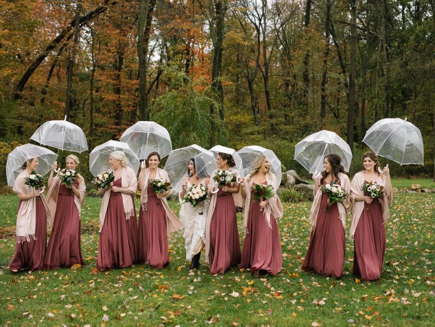 Bridal party portraits in the rain at the Brandywine Manor House wedding.