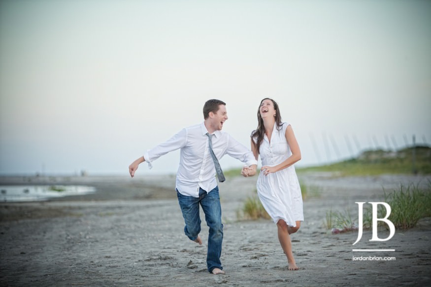 Dominique and Brad running on Ocean City NJ beach at sunset