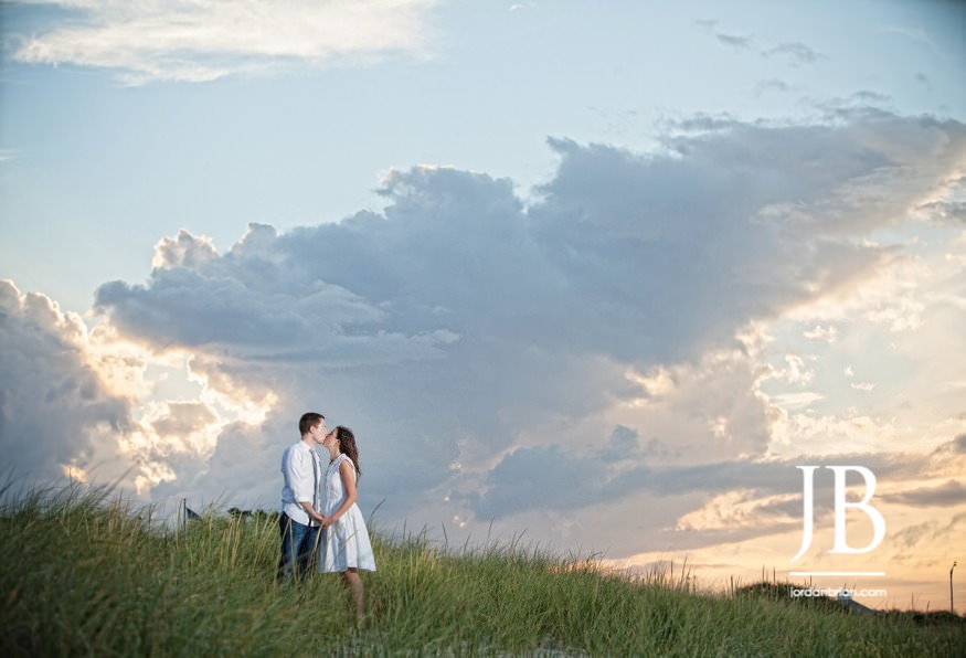 Couple on the beach at golden hour during Ocean City NJ engagement session