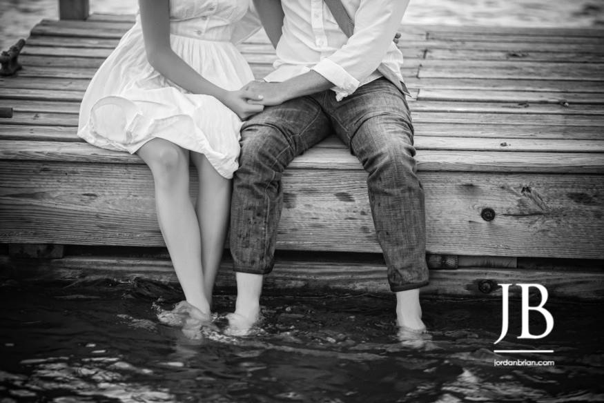 Engaged couple at the waterfront dock during Ocean City NJ engagement portraits