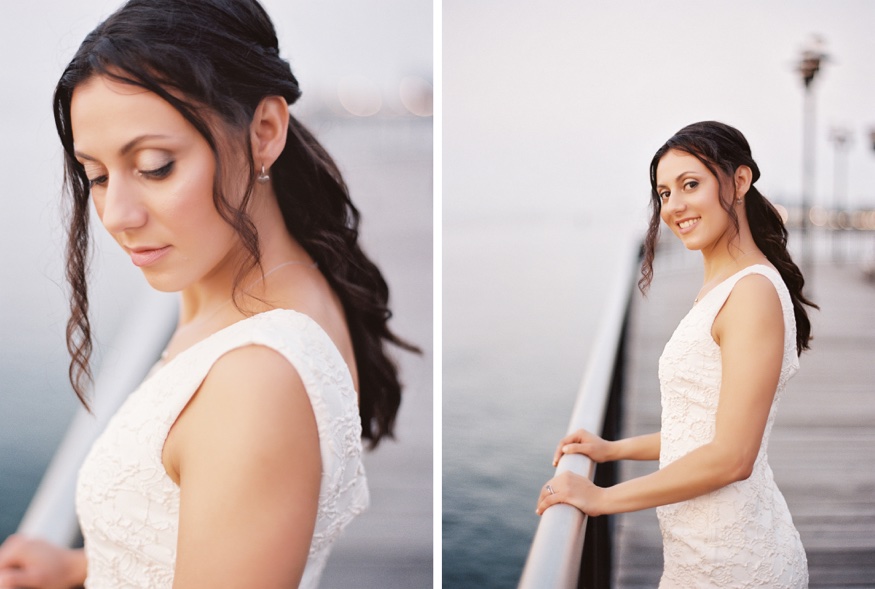 Elina reaching up to touch Thomas's face during their NYC sunrise engagement session.