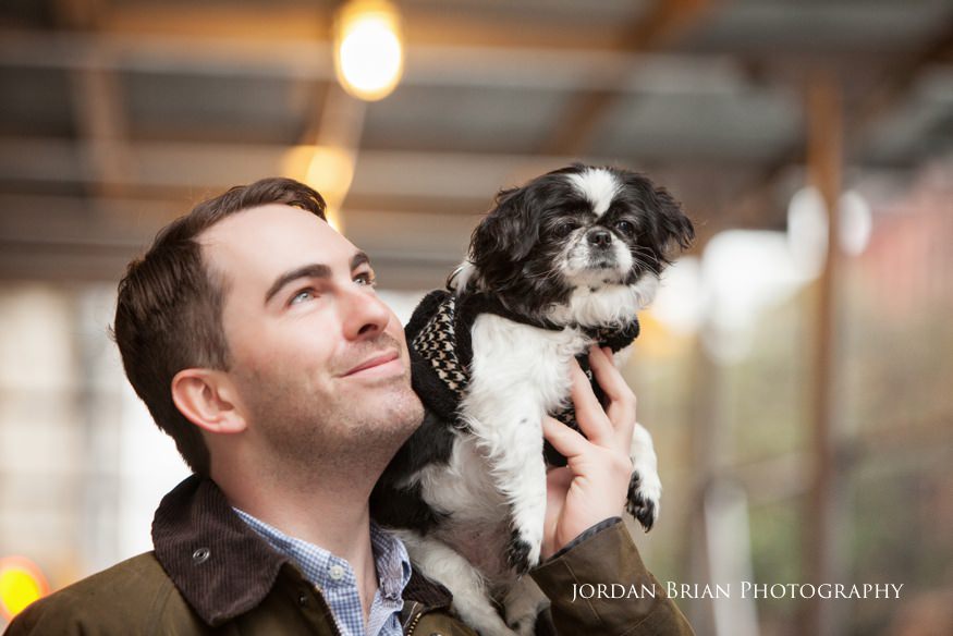 groom with dog at nyc engagement session