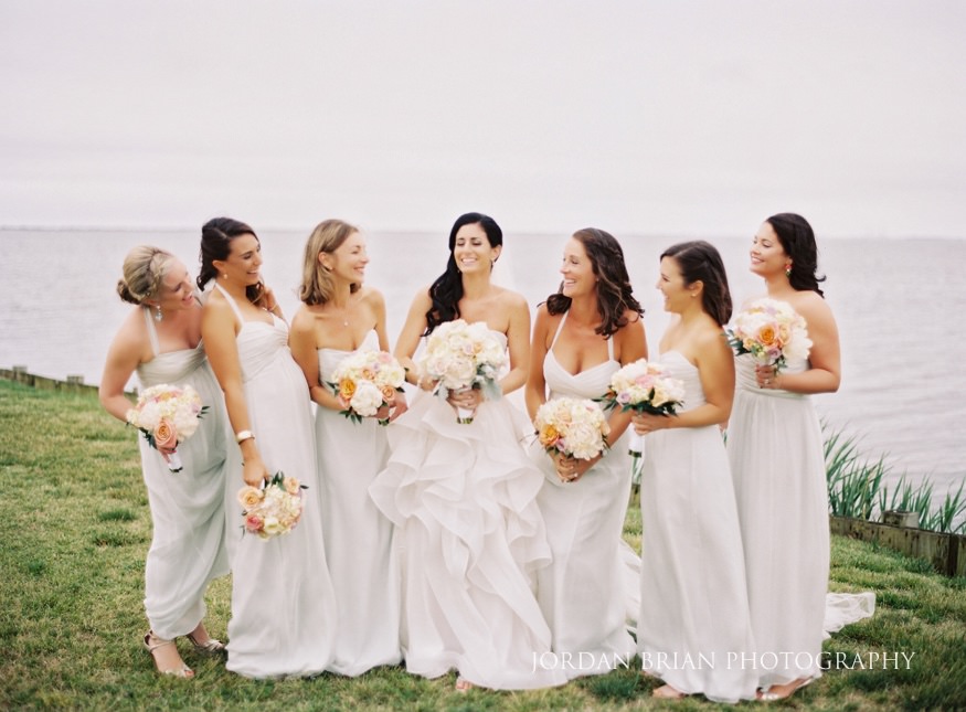 bride and bridesmaids at rehoboth beach country club wedding