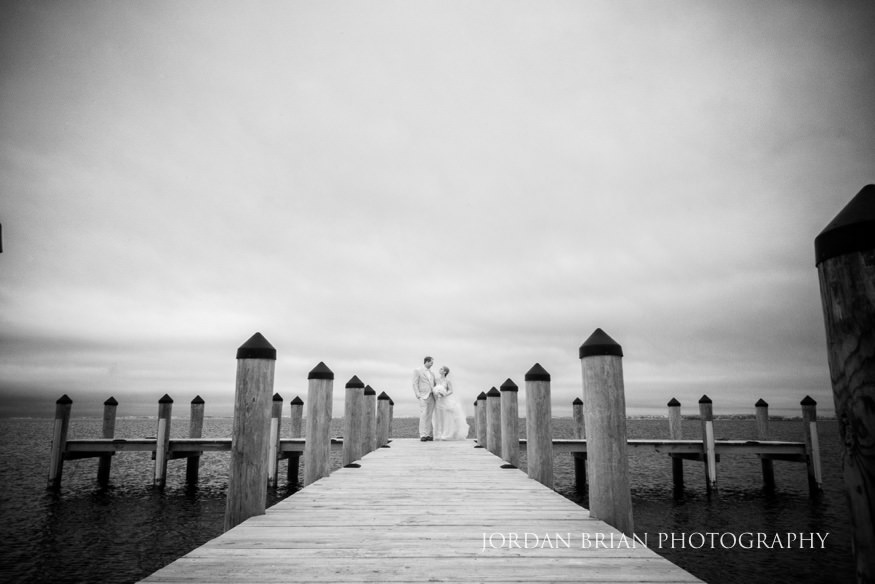 infrared portrait of couple on dock at rehoboth beach wedding
