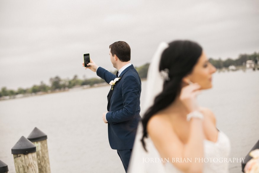 groom taking a selfie at rehoboth beach country club wedding