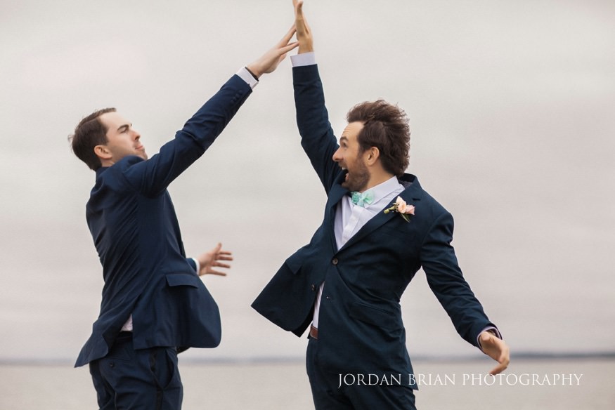 groom and groomsmen high five rehoboth beach country club wedding