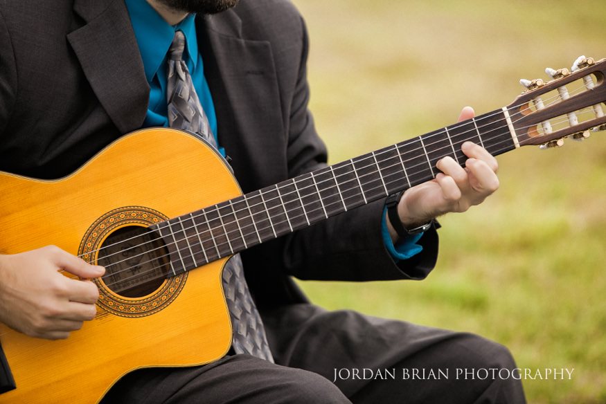 guitar player at outdoor wedding ceremony at rehoboth beach country club