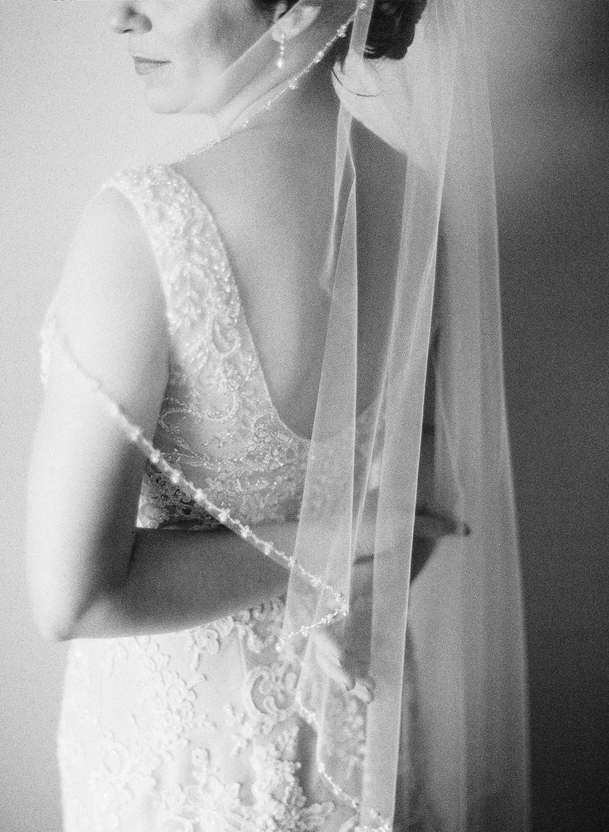Bride's portraits at Courtyard Marriott before Pen Ryn wedding.