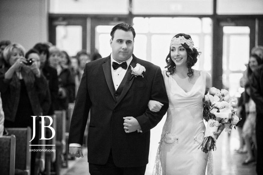 Francesca walking down the aisle at her winter wedding ceremony