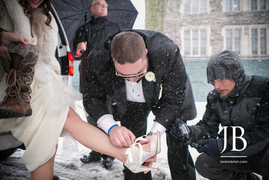 Francesca and Michael walking through the snow at Princeton University