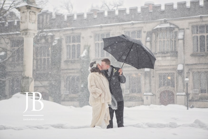 Francesca and Michael embracing in the snow on Princeton's campus