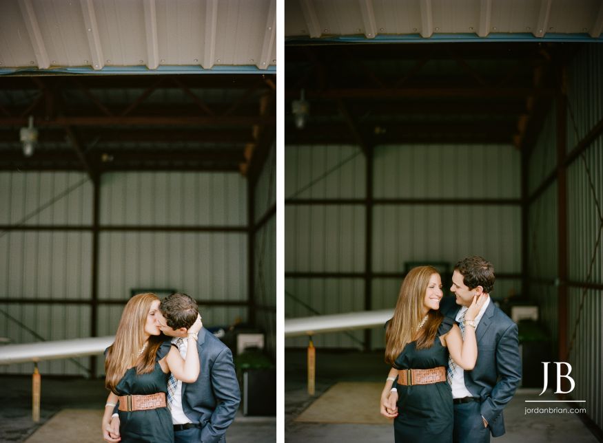 Gina and Steve close portrait during South Jersey engagement session with vintage aircraft nearby