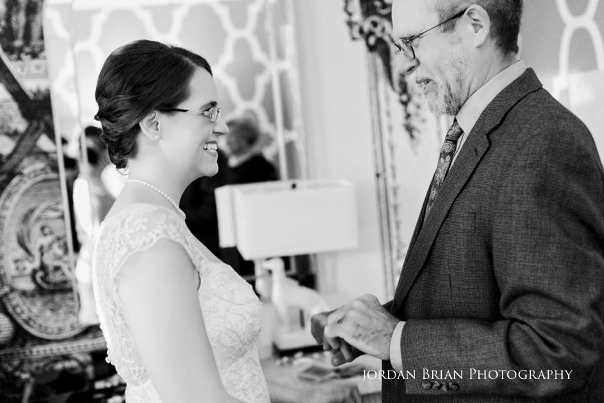 Grace and Max exchanging vows at Philadelphia Federal Courthouse with judge officiating