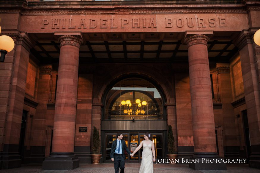 Grace and Max elopement portrait in Old City Philadelphia at dusk