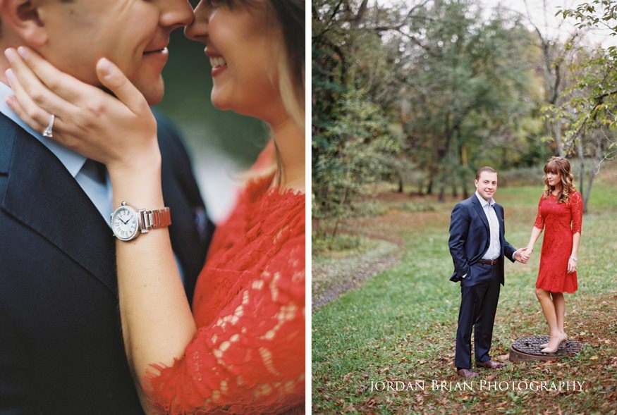 Couple walking through wooded trail at Medford Park fall engagement session