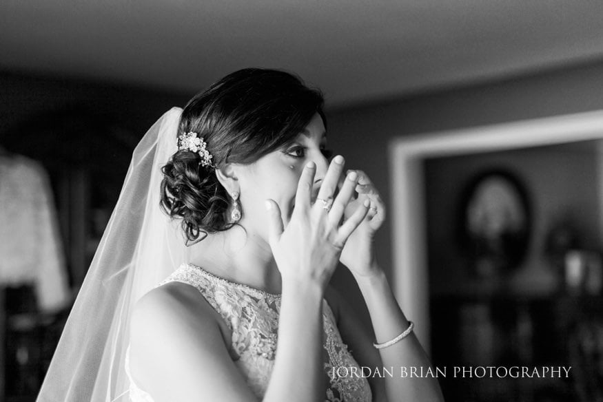 Bride seeing father for the first time on her wedding day.