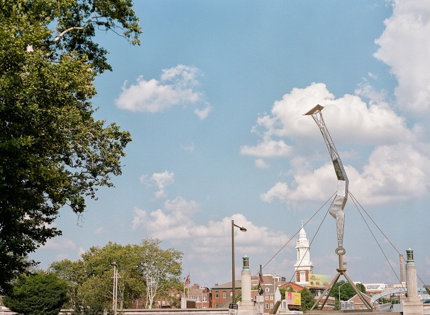Bolt of Lightning sculpture at Franklin Square Philadelphia, Ben Franklin Bridge in background.