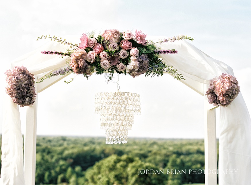 Outdoor wedding ceremony at Trump National Golf Course.