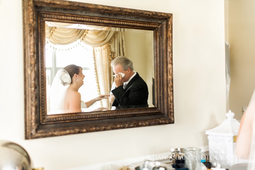 Father and bride first look on wedding day.