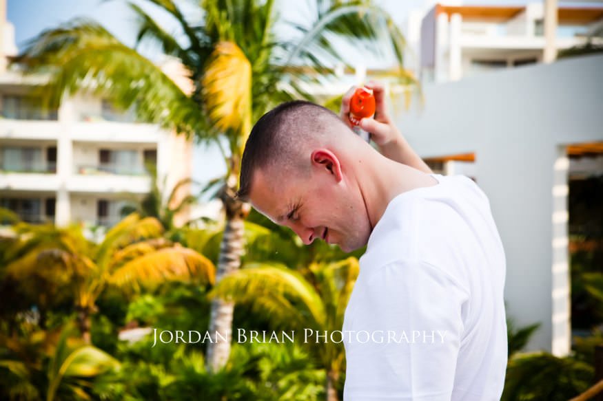 Jillian and Ryan engagement session in tropical garden setting Playa Mujeres
