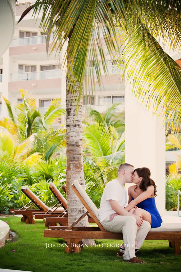 Jillian and Ryan engagement portrait in spa setting Excellence Resort Mexico