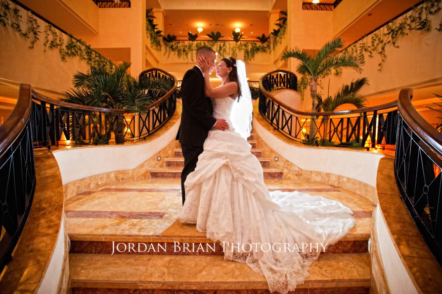 Jill and Ryan sunset portrait at Excellence Resort Mexico