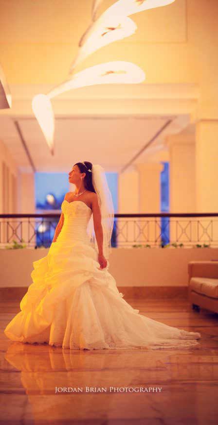 Jill bride vertical portrait at Excellence Resort Mexico