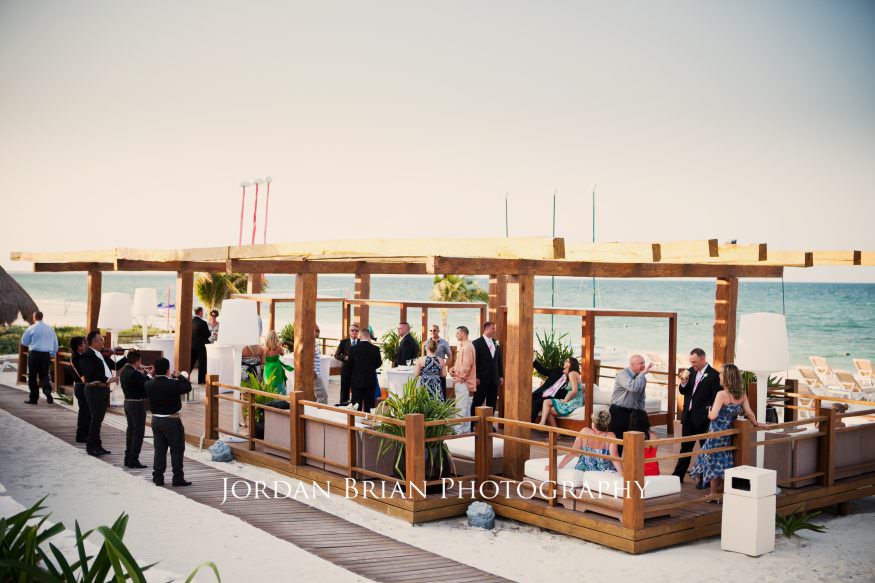 Cocktail hour on the beach at Excellence Resort Playa Mujeres Mexico
