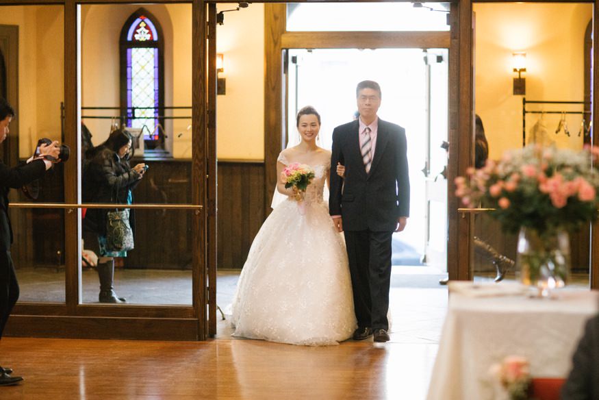 Bride walking down the aisle at Chinese Philadelphia Wedding ceremony.