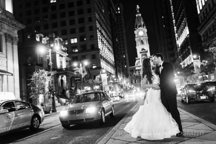 bride and groom night portraits in philadelphia city hall