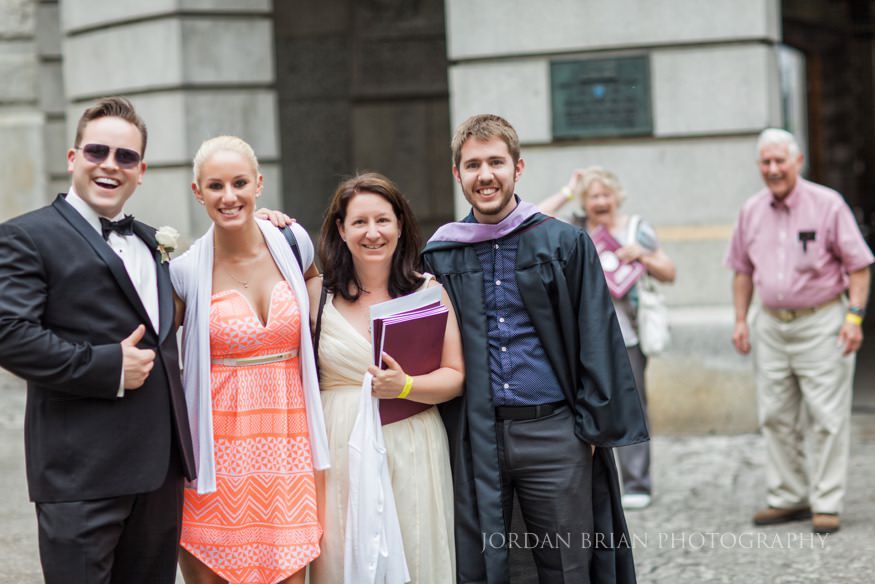 photobombed portrait of bridal party portrait at city hall in philadelphia